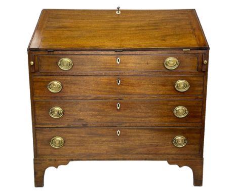 George III mahogany bureau, the fall-front banded and with boxwood stringing, enclosing fitted interior with pigeonholes and 