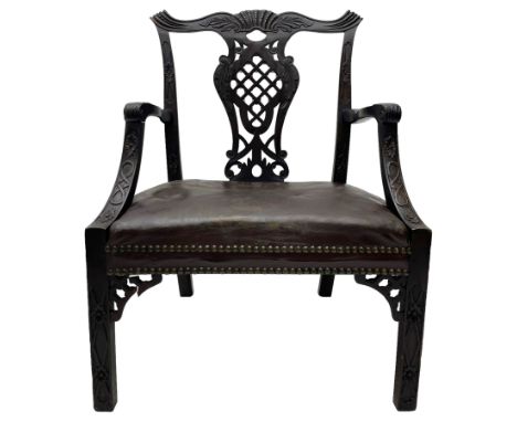 Early 20th century Chippendale design mahogany elbow chair, possibly Irish, the cresting rail carved with extending and scrol