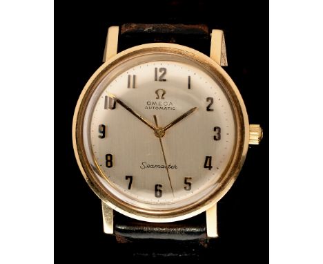 Omega: a 1970's Seamaster gold gentleman's wristwatch , circular silvered dial with arabic numerals and outer minute track, s