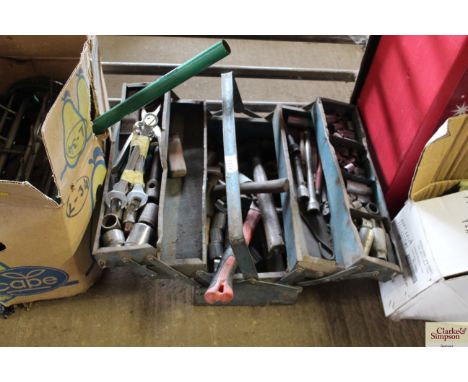 A cantilever tool box and contents of various tools to include spanners, socket sets, hammers etc.