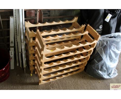 Two sets of six shelf wine racks 