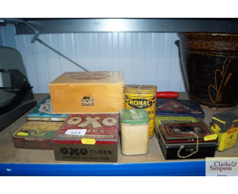 A collection of various advertising tins; a rolling pin etc