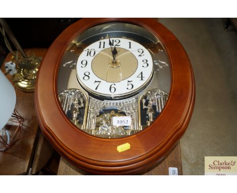 A Small World rhythm wall clock