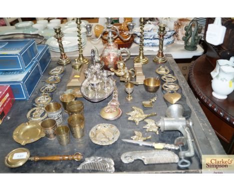 A collection of various metal-ware to include brass candlesticks, copper and brass teapot, horse brasses etc.