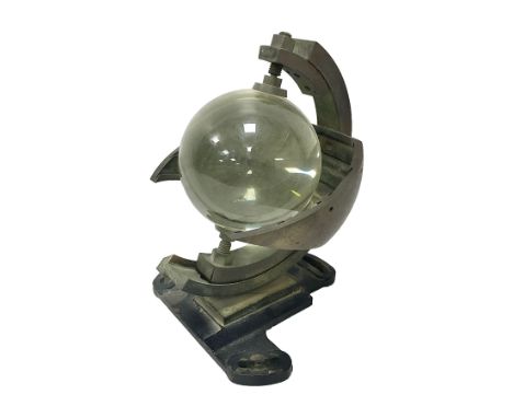 Sunshine recorder by Casella London, No 5997, a glass sphere mounted into a curved brass plate, H22cm