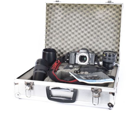 Yashica 230-AF camera outfit, including camera body serial no. 0184693, three Yashica lenses comprising AF 70-200mm 1:4.5 ser