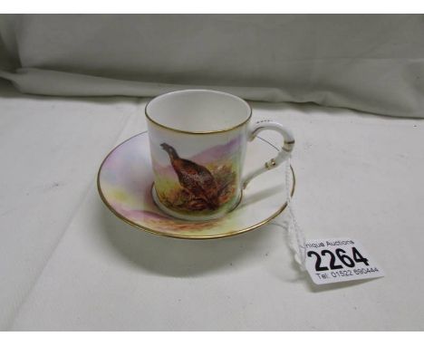 A Royal Worcester James Stinton game birds coffee can and saucer.No visible damage.