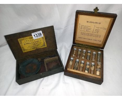 A cased London screw set with vials of miniature screws plus pan scales 