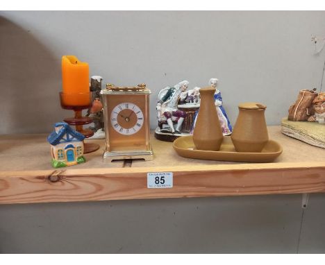 A modern brass carriage clock, decorative ornaments and part retro cruet set 