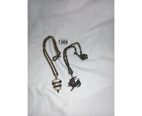 2 good and unusual silver coloured necklaces, 1 of a Lion &amp; 1 with mother of pearl, stamped 925. 