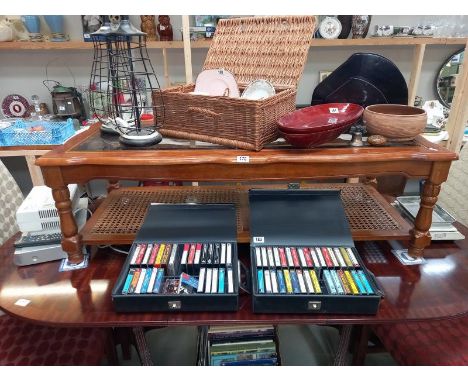 A mahogany coffee table with bevel glass top and bergere panel shelf. 133 cm x 57cm x height 42cm, COLLECT ONLY.