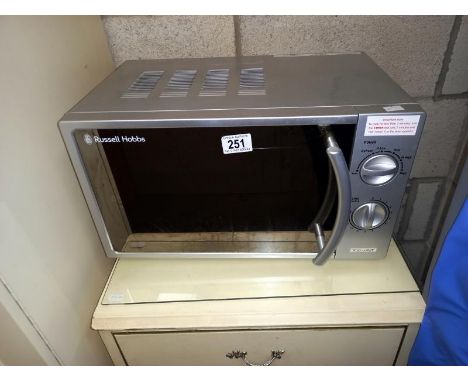 A Russell Hobbs 700 watt microwave (model RHM1709-G)