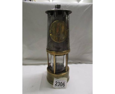 An Eccles Protector Lamp Lighting Co., Ltd Davy Lamp, No. 55/2496G. 