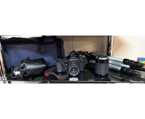 A Pentax 35mm camera (model A3) with carry bag, extra lenses &amp; tripod etc. 