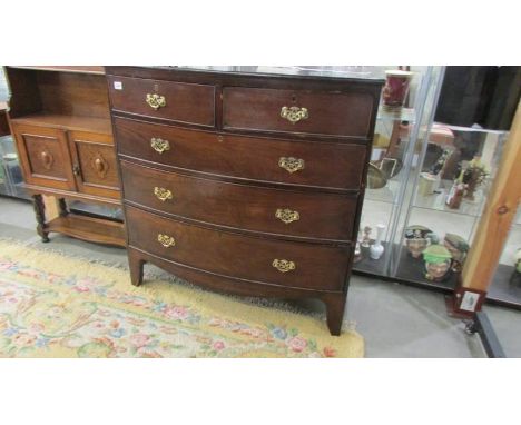 A Victorian mahogany bow front chest of drawers with brass handles, COLLECT ONLY.