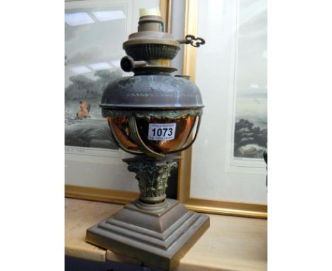 A Victorian brass Corinthian lamp (no shade or chimney) 