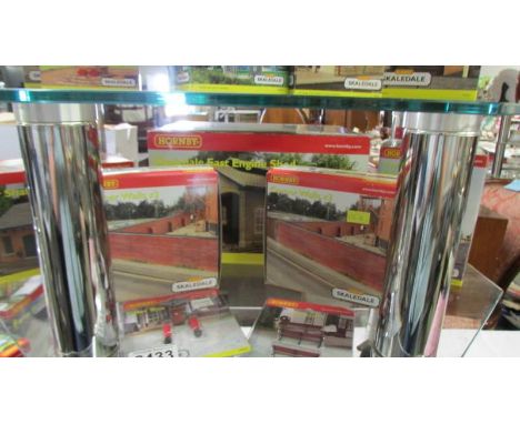 A quantity of boxed Hornby Skaledale buildings &amp; walls including East Engine shed, GWR water column, corner walls etc.,