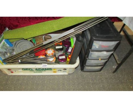 A good lot of '00' gauge model railway layout accessories, jars and contents etc.,