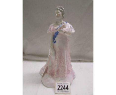 A Royal Worcester figurine, Her Majesty Queen Elizabeth The Queen Mother, 17/9000. 