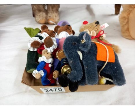 A steiff limited edition miniature clown bear, a Steiff elephant and four other miniature bears.