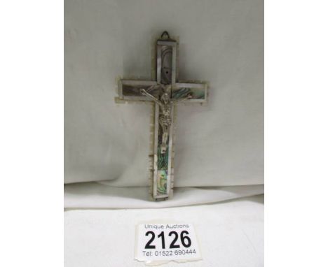 An early 20th century mother of pearl crucifix, 12.5 x 7 cm. 