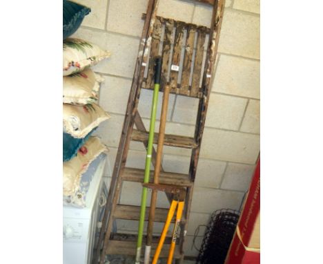 A wooden step ladder &amp; garden tools