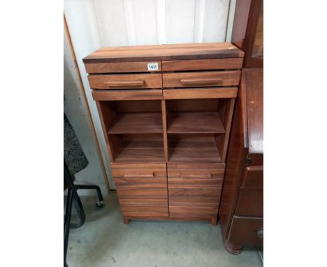 A teak shelf unit with drawers. 60cm x 26cm x 106cm high COLLECT ONLY 