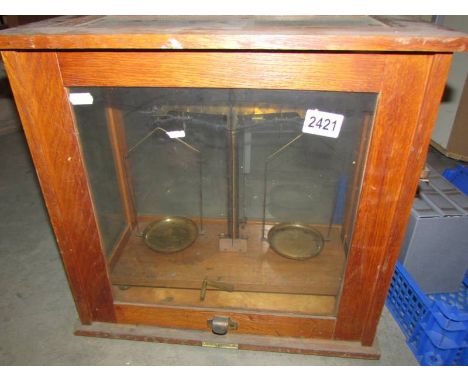 A cased set of apothecary scales, COLLECT ONLY.