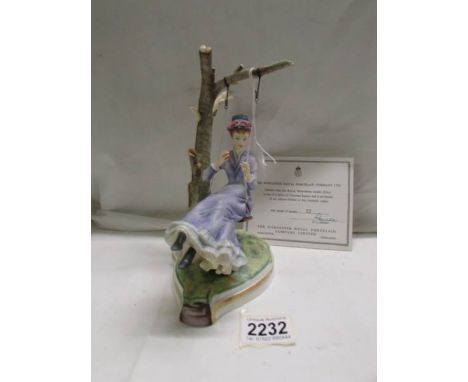 A Royal Worcester limited edition figurine, 'Alice', 12/500.No box, missing the bow from the back of the dress.