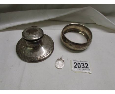 A hall marked silver inkwell, a silver pendant and an EPNS bangle.