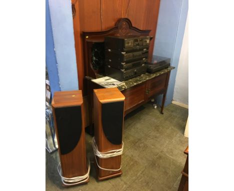 A Technics four tier stack system, a Hitachi HT- 350 turntable and a pair of Castle speakers 