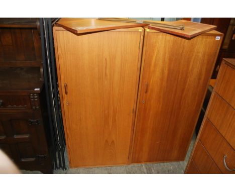 A pair of Staples Ladderax wardrobes, each with under tier shelf, 59cm wide, 40cm deep, 131cm height