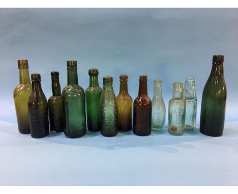 Twelve glass advertising bottles 'Gateshead' to include; 3 Dowson Brothers, 2 J. Kershaw, J. Wilkinson, 2 Joseph Wilkinson, G