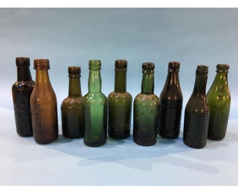 Nine glass advertising bottles of Sunderland to include Laing and Co., 2  Fenwick and Co., Elwen, Wm Robson, J. R. Cutter, Ja