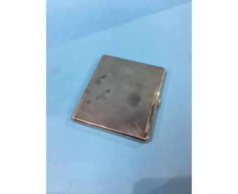 A Birmingham silver engine turned cigarette case, 141.9 grams, 4.5 oz