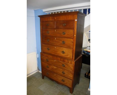 A 19th century mahogany chest on chest, with two short and six long drawers, supported on bracket feet, 111cm wide, 200cm hei