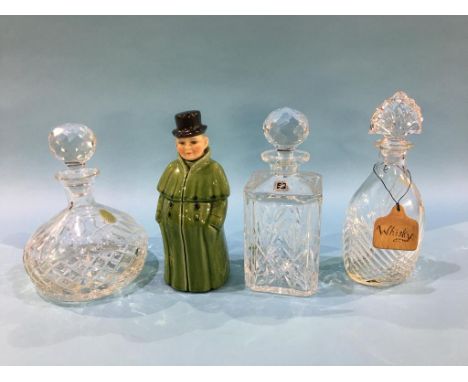 Three decanters and a Continental figural decanter