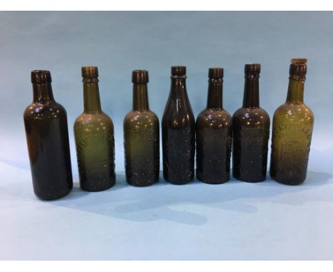 Seven glass advertising bottles 'Sunderland' to include; Elwen, T. Elwen and Son, R. Fenwick and Co. Ltd, Wm Davidson and Son