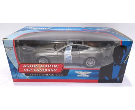 Paul's Model Art, "James Bond 007" Aston Martin V12 Vanquish from "Die Another Day" 1:18 Scale Model. Although unchecked for 