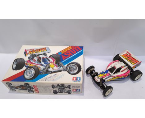 Tamiya, Super Astute 1:10 Scale RC Off Road Racer. Although unchecked for completeness or if in working order condition appea