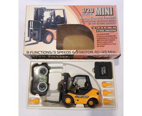 A boxed unbranded 1:20 Scale RC Forklift. Although unchecked for completeness or if in working order condition appears genera