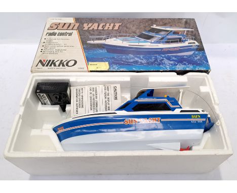 Nikko, a boxed "Sun Yacht" radio controlled 1:20 Scale model boat. Although unchecked for completeness or if in working order