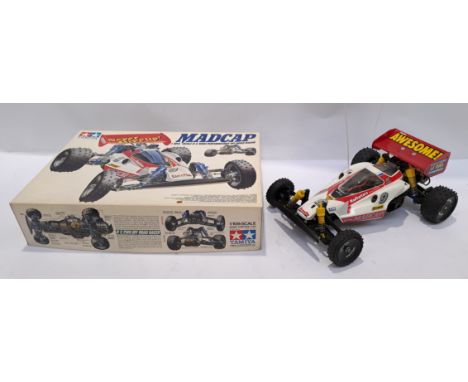 Tamiya, Madcap 1:10 scale RC Off Road Racer. Although unchecked for completeness condition appears generally Good to Good Plu
