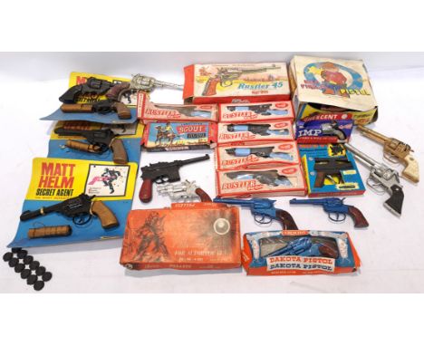 Cresent, Lone Star &amp; Similar a unboxed &amp; boxed group of Die-Cast Gun &amp; Cap Guns. Includes "Matt Helm Secret Agent