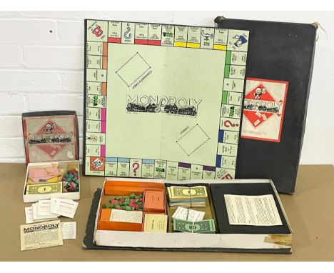 2 boxes of vintage Monopoly. 