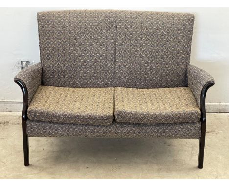 A vintage Parker Knoll 2 seater sofa. Model 749/1014. 121cm 