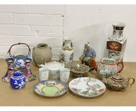A collection of early 20th century and modern Chinese and Japanese pottery. A vintage Prunus jar, Mudman figure etc 