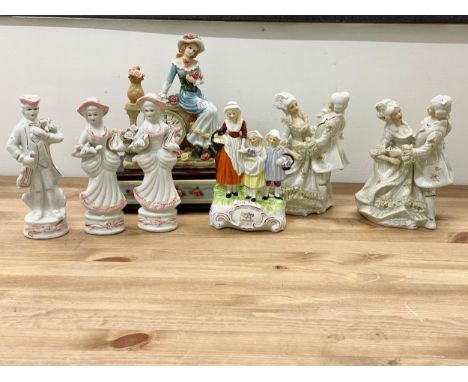 A collection of vintage pottery figurines and a figurine mantle clock. Clock measures 22x12x28cm 