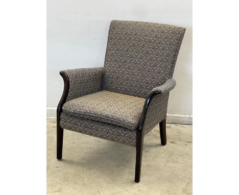 A vintage Parker Knoll armchair. Model 749/1014. 