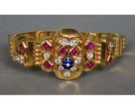 An unmarked high carat gold, ruby, clear sapphire and enamel set bracelet
17.5 cm long. CONDITION REPORTS: Overall good, some